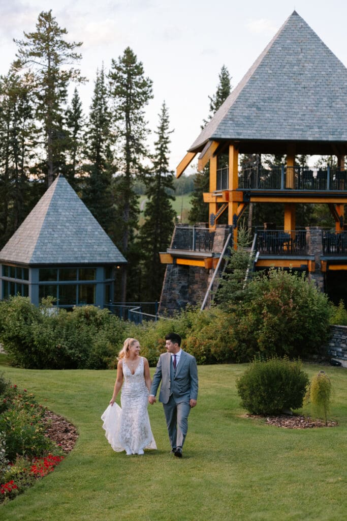 A couple walks in front of the gazebo at Azuridge Estate Hotel